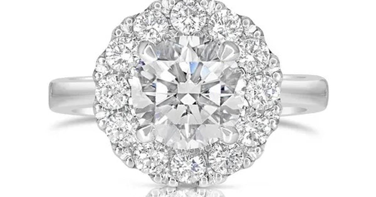 Halo diamond engagement ring in white metal from Scagnetti Fine Jewellers Perth