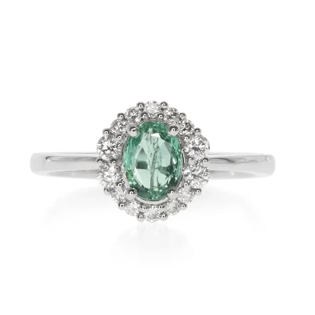 Emerald & Diamond Halo Ring in 950 Platinum