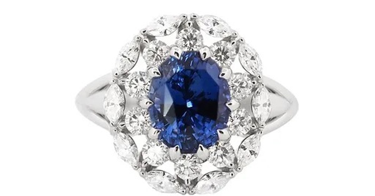Blue sapphire ring with diamond halo handcrafted by Scagnetti Fine Jewellers Perth