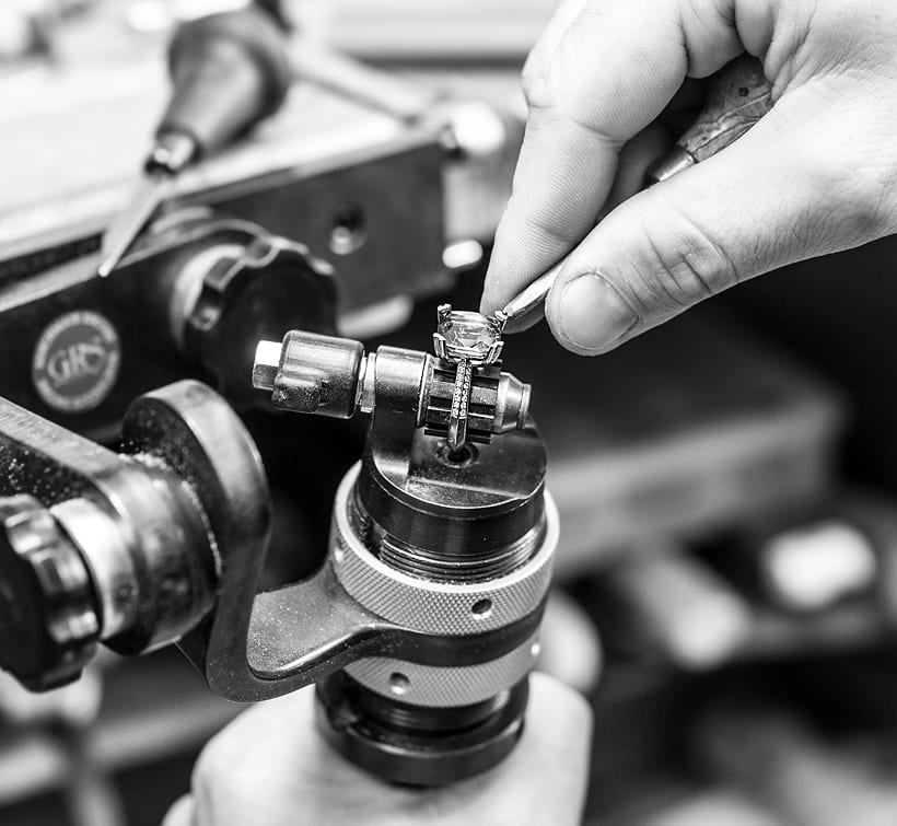 Precision gemstone setting under magnification